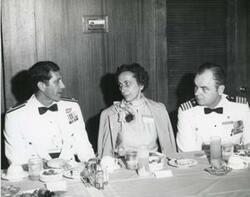 ["Black and white photograph of a banquet in McAlester, Oklahoma on Armed Forces Day. 1974"]