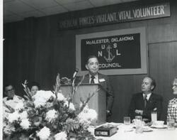 ["Black and white photograph of a banquet in McAlester, Oklahoma on Armed Forces Day. 1974 Carl Albert shown in 3903 and 3906"]
