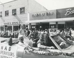 ["Black and white photograph of a banquet in McAlester, Oklahoma on Armed Forces Day. 1974 Carl Albert shown in 3903 and 3906"]