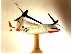 ["Color photograph of a miniature airplane model, specifically a proprotor VTOL Aircraft by Bell Tilt"]