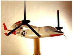 ["Color photograph of a miniature airplane model, specifically a proprotor VTOL Aircraft by Bell Tilt"]