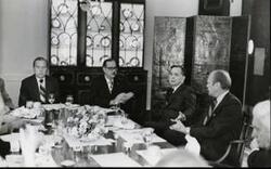 ["Black and white photograph of Gerald R. Ford, Carl Albert, John Rhodes, Hugh Scott, and Mike Mansfield shown at a bipartisan leadership breakfast on September 18, September 18, 1974"]