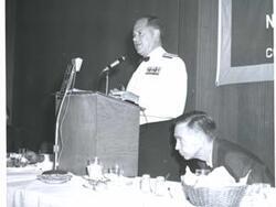 ["Carl Albert preparing to take the speaker's stand at a banquet in McAlester, Oklahoma on Armed Forces Day 1967"]