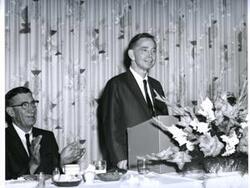 ["Carl Albert speaking at a banquet in McAlester, Oklahoma on Armed Forces Day 1967"]