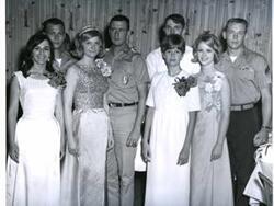 ["A group of people in McAlester, Oklahoma on Armed Forces Day. 1967"]
