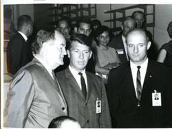 ["Hubert H. Humphrey with astronauts Walter Schirra, and Thomas Stafford."]