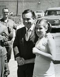 ["Carl Albert with a young girl in McAlester, Oklahoma on Armed Forces Day. 1971"]