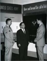 ["Carl Albert at the Medal of Honor exhibit with Sergeant Ted Fertig and Sergeant First Class John Blaine on Capitol Hill."]