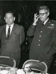 ["Carl Albert with a military general."]