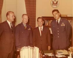 ["Carl Albert, Major Fisher and others shown. Major Fisher is a Medal of Honor recipient -- Vietnam in Albert's office."]