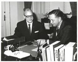 ["Black and white photograph of Carl Albert and an unidentified man."]