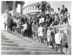 ["Black and white photograph of Carl Albert with an unidentified group."]