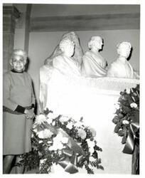 ["Black and white photograph of Sibyl Moses with bust of three women. Handwriting on back of photo stating, \" Sibyl Moses.\""]