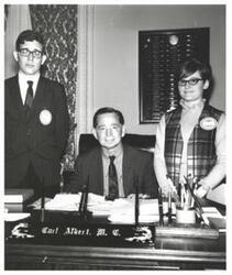 ["Black and white photograph of Carl Albert with two recipients of the Seal of a Presidential Classroom Young Americans. (same as #4259)."]