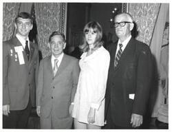 ["Black and white photograph of Carl Albert with VICA national officer and Page Belcher."]