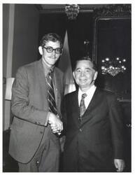 ["Black and white photograph of Carl Albert with Jim Logan, a Ewing Fellow. August 1, 1971"]