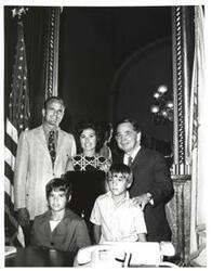 ["Black and white photograph of Carl Albert with the Bob Poe family of McAlester, Oklahoma. July 26, 1971"]