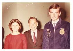 ["Color photograph of Carl Albert with Carly Jo Harl and Robert Randall Harl of Temple, Oklahoma. 1968"]