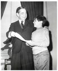 ["Black and white photograph of Carl Albert with an unidentified boy."]
