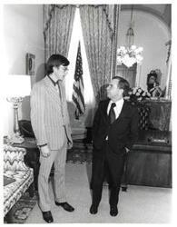 ["Black and white photograph of Carl Albert with an unidentified young adult."]