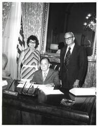 ["Black and white photograph of Carl Albert with Mr. and Mrs. Leonard Sherrer of Snow, Oklahoma."]