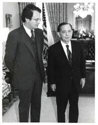 ["Black and white photograph of Carl Albert with an unidentified man."]