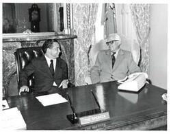 ["Black and white photograph of Carl Albert and Mr. Pruddy."]