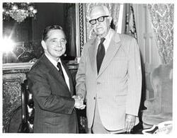 ["Black and white photograph of Carl Albert and Mr. Pruddy."]