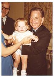 ["Color photograph of Carl Albert with baby (from Oliver Benson), and two others."]