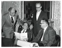 ["Black and white photograph of Carl Albert with Raymond Ferguson, Erwin Culley, and Andrew Hinkle of Pauls Valley, Oklahoma."]