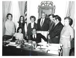 ["Black and white photograph of Carl Albert with Mr. and Mrs. Jim Pate, their daughter Marti, Mr. and Jack Dyer, their daughter Shannon, and Mr. and Mrs. D. Jo Ferguson. March 7, 1973"]
