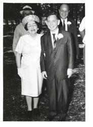 ["Black and white photograph of Carl Albert with John T. Koen, Cy Perkins, and an unidentified woman."]
