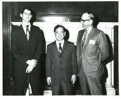 ["Black and white photograph of Carl Albert with a group from the President's Committee on Employment of the Handicapped."]
