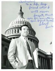 ["Black and white photograph of Lloyd Sauls.  Handwritten note from Sauls, to Charlie Ward, thanking him for his friendship on the front of the photograph."]