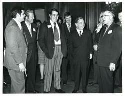 ["Black and white photograph of Carl Albert with a group of Oklahoma automobile dealers. February 24, 1972"]
