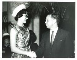 ["Black and white photograph of Carl Albert with a woman."]