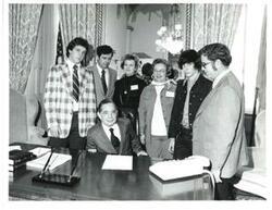 ["Black and white photograph of Carl Albert with the families of Jack Dyer and Jim Pate. March 1975"]