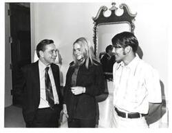 ["Black and white photograph of Carl Albert with a couple."]