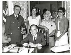 ["Black and white photograph of Carl Albert with the Robert Saunier family. June 10, 1974"]