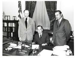 ["Black and white photograph of Carl Albert with Don Stuart and Bob Duren."]
