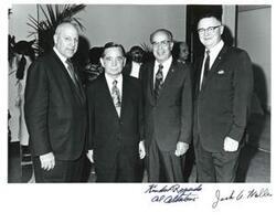["Black and white photograph of Carl Albert with Jack Wallen, Albert Albertoni, and another unidentified man. Note: Handwriting on front identifying two of the three people (other than Carl Albert) on the front of the photograph."]
