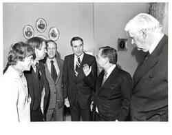 ["Black and white photograph of Carl Albert, Thomas P. O'Neill, Wes Watkins, John J. McFall, John Brademas, Lou Watkins, and an unknown woman. September 1976"]