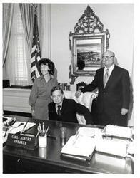 ["Black and white photograph of Carl Albert with Judge ? West and an unidentified woman."]