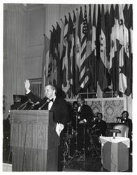 ["Black and white photograph of Carl Albert standing at a podium at the American Revolution Bicentennial Ball in Oklahoma. October 2, 1976"]