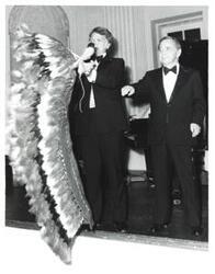 ["Black and white photograph of Carl Albert with Governor George Nigh at the American Revolution Bicentennial Ball in Oklahoma. October 2, 1976"]
