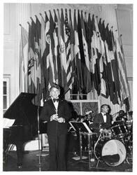["Black and white photograph of George Nigh speaking at the American Revolution Bicentennial Ball in Oklahoma. October 2, 1976"]