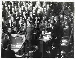 ["Black and white photograph of Richard M. Nixon giving the State of the Union message to members of Congress. Carl Albert is shown in the House Speaker's seat."]