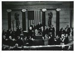 ["Black and white photograph of  Gerald R. Ford after being sworn into office. From left: Betty Ford, Carl Albert, Gerald R. Ford, James O. Eastland, and Richard M. Nixon. December 6, 1973"]