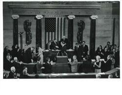 ["Black and white photograph of  Gerald R. Ford after being sworn into office. From left: Betty Ford, Carl Albert, Gerald R. Ford, James O. Eastland, and Richard M. Nixon. December 6, 1973"]
