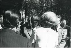 ["Black and white photograph print of Leonid Brezhnev, Millicent Fenwick, and others standing outside. House delegation trip. August 1975"]